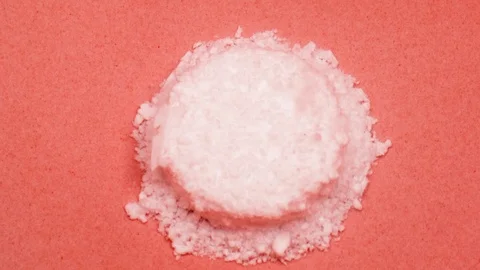 A pill dissolving in water speed up in macro Stock Footage 129520211