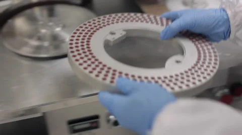 Pill Encapsulation Machine - Changing the Rotary Disc Stock Footage 67888382