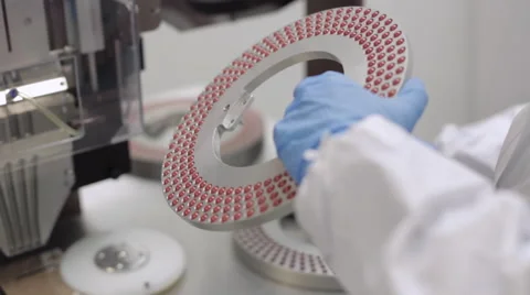 Pill Encapsulation Machine - Changing the Rotary Disc Stock Footage 67888441