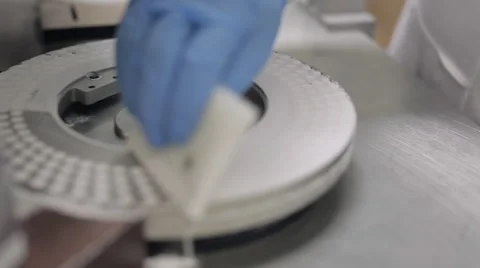 Pill Encapsulation Machine - Scraping Off Excess Powder Stock Footage 67888384