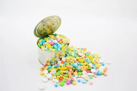 Pill is full of cans Stock Photos
