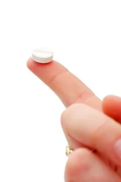 Pill in hand Stock Photos