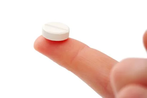 Pill in hand Stock Photos