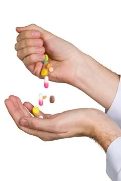 Pill in a hand 스톡 사진