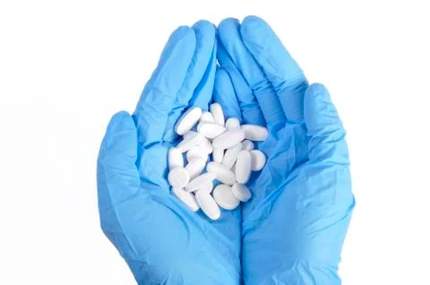 Pill on hand Stock Photos