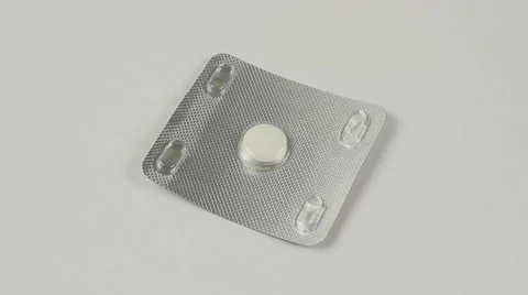 Pill isolated on white background, macro closeup rotation Video stock 53789600