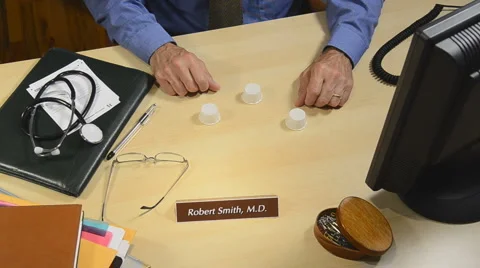 Pill monte on desk 8 Stock Footage 5382409