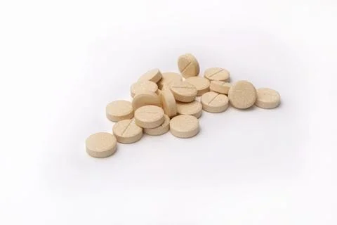 Pill, a small round mass of solid medicine to be swallowed whole. Stock Photos