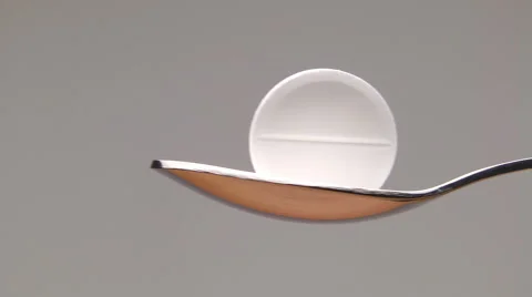 Pill in a spoon Stock Footage 62255667