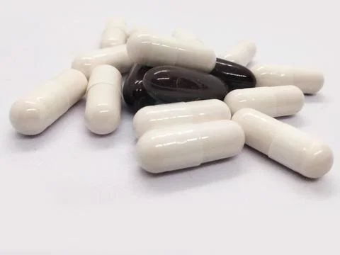 Pill on white background Stock Photos