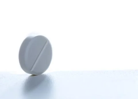 Pill on white Stock Photos