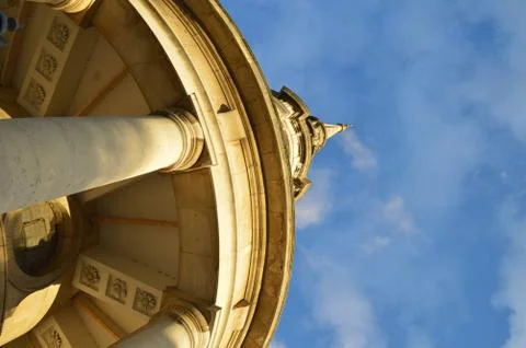 Pillar and ceiling of an ancient building with blue sky background Stock Photos