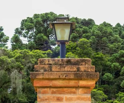 Pillar of bricks with garden light Stock Photos
