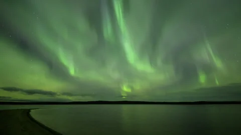 Pillars diffuse aurora over the lake Stock Footage 250293125