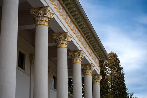 Pillars shot from frontal with a low angle and blue sky Foto stock