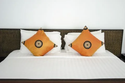 Pillow on the bed Stock Photos