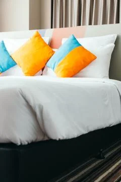 Pillow on bed Stock Photos