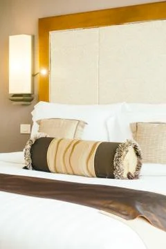 Pillow on bed Stock Photos