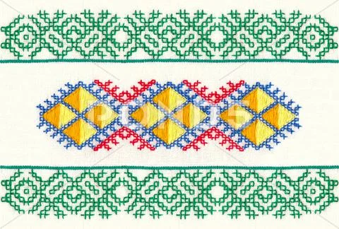 Pillow embroidered with a cross, made from natural fabrics and embroidered by Stock Photos