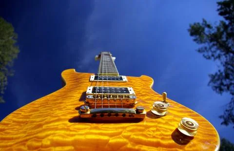 Pillow maple guitar Stock Photos