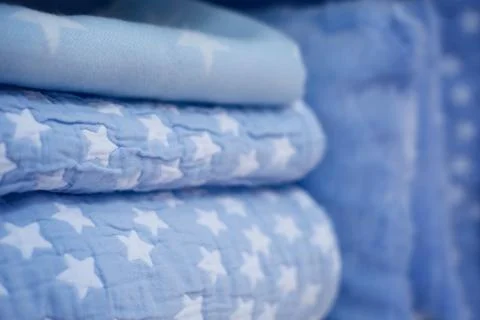 Pillows and blankets on showcase 스톡 사진