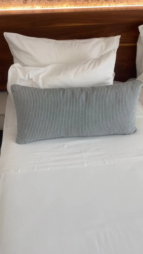 Pillows on the bed in a hotel room. Vertical video  Stock Footage 286124253
