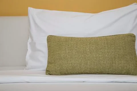 Pillows on bed Stock Photos