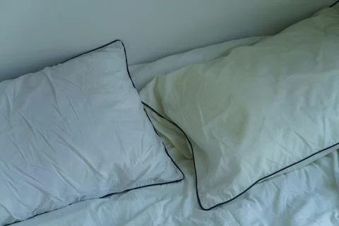 Pillows on a bed white Stock Photos
