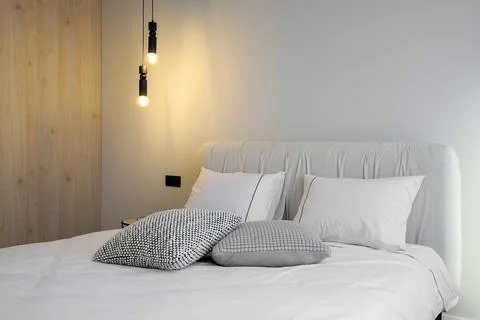 Pillows on the double bed in the bedroom Photos