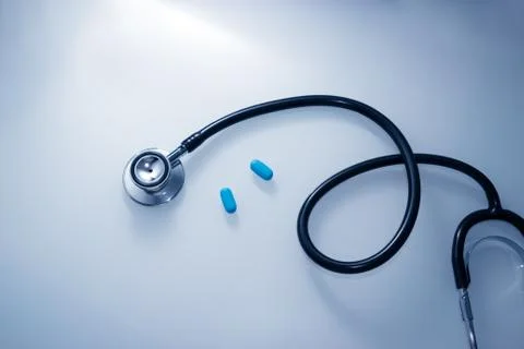 Pills and stethoscope 스톡 사진
