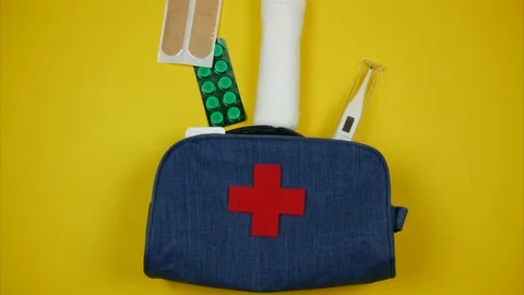 The pills are moving to the first-aid kit. Stop motion Video stock 100974544