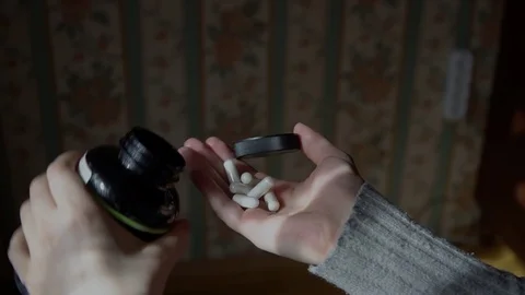  pills are poured into the hand Stock Footage 127207484