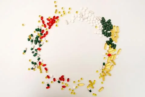 Pills background. Circle of assorted various medicine tablets and pills diffe Stock Photos