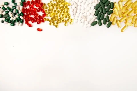 Pills background. Heap of assorted various medicine tablets and pills differe Foto stock