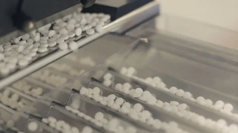 Pills being Prepared for Bottling Stock Footage