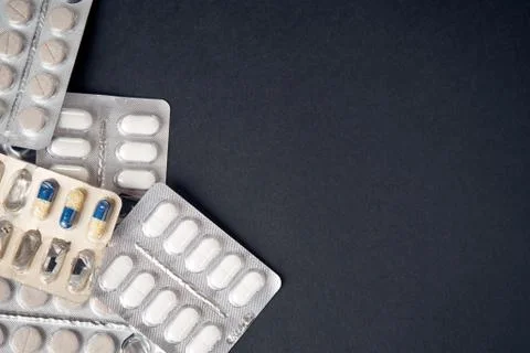 Pills on black background Stock Photos