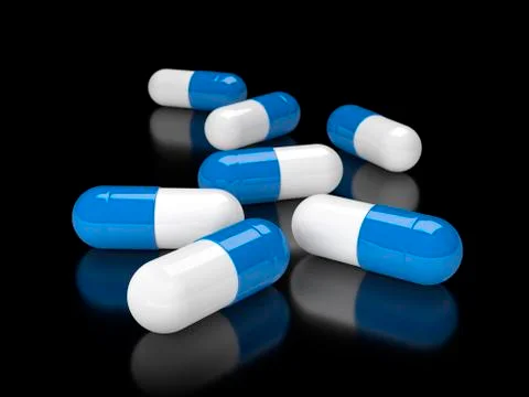 Pills on black Stock Illustration