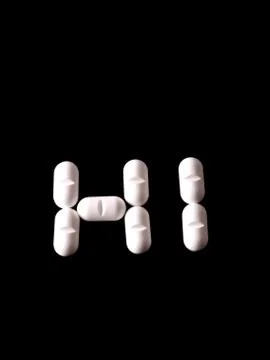 Pills on black 스톡 사진