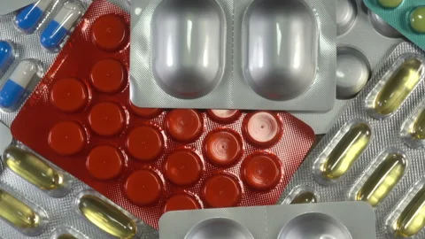 Pills in blisters rotate Stock Footage 150156153