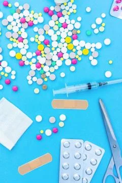 Pills on a blue background Stock Photos
