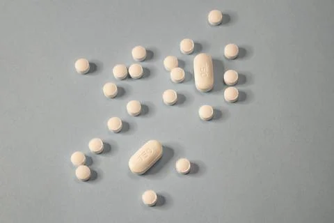 Pills on blue background 库存照片