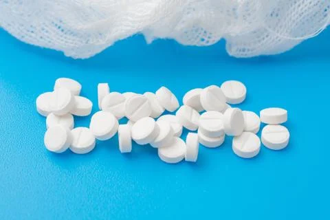 The pills on a blue Stock Photos