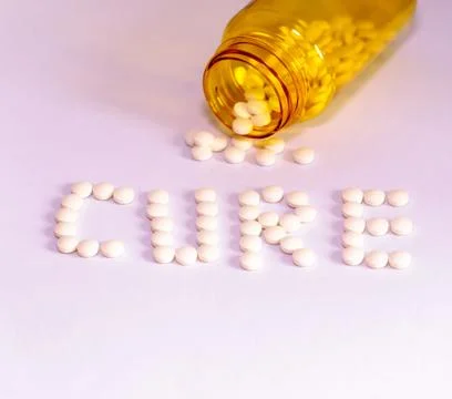 Pills with bottle in background 写真素材