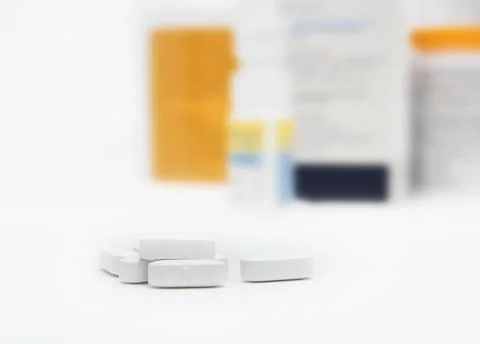 Pills with bottle background Stock Photos