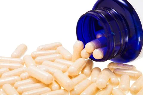 Pills from bottle isolate on the white background. with clipping path Stock Photos