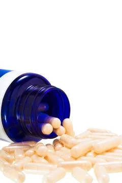 Pills from bottle isolate on the white background. Foto stock