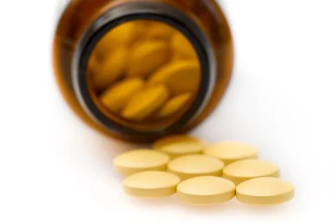 Pills in bottle Stock Photos