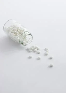 Pills in a bottle Stock Photos