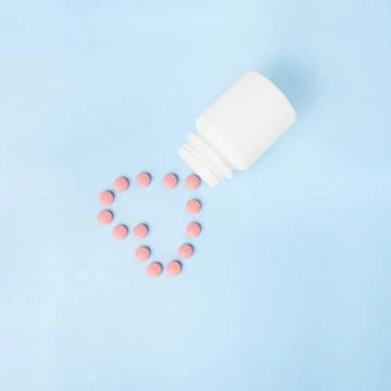 Pills in the bottle. Stock Photos