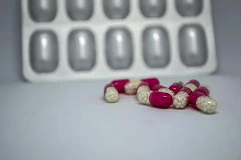 Pills, capsules with the drug on a white background. Stock Photos